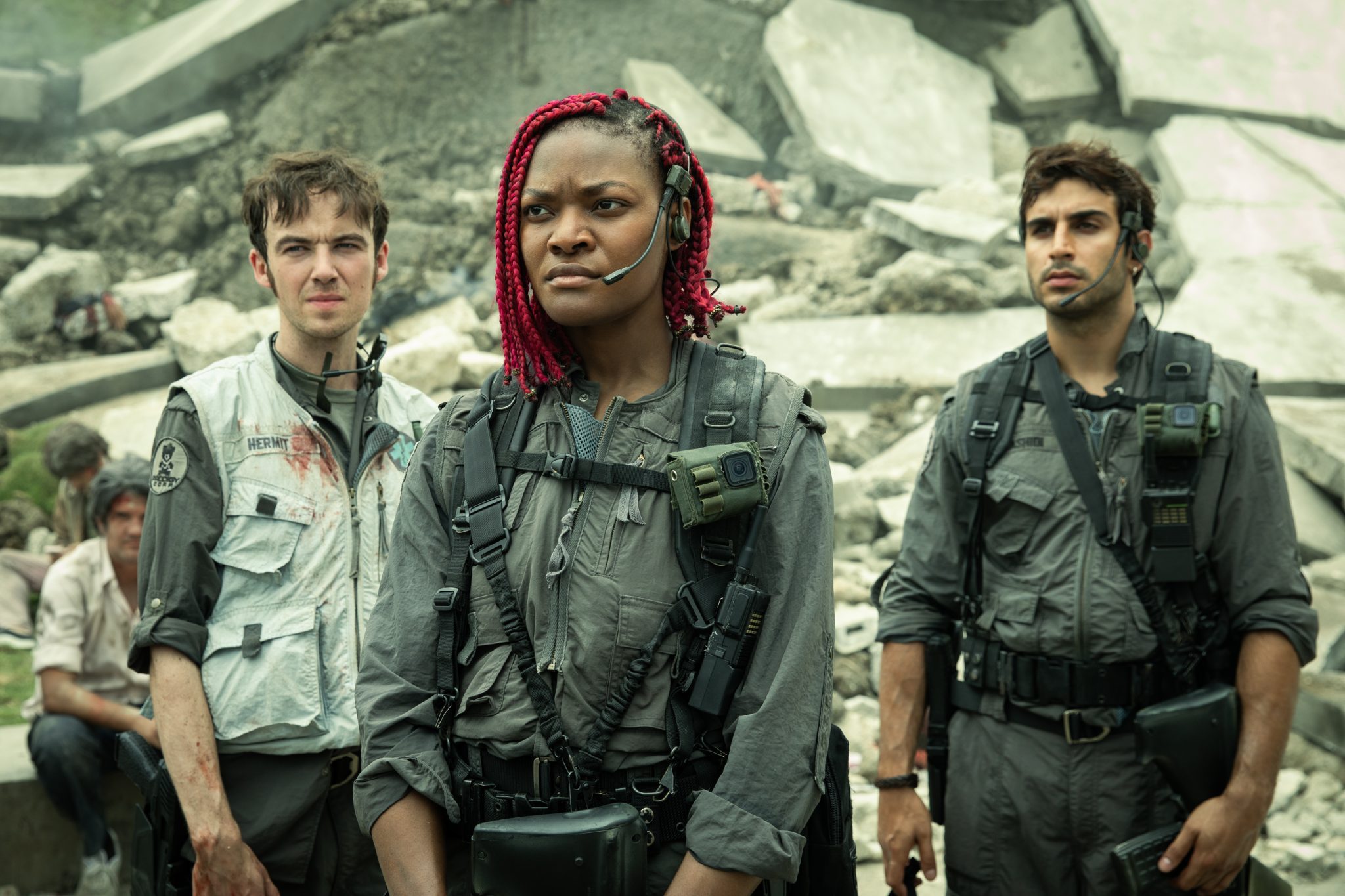 FX's Alien: Earth -- Pictured: (l-r) Alex Lawther as Hermit, Diêm Camille as Siberian, Moe Bar-El as Rashidi. CR: Patrick Brown/FX
